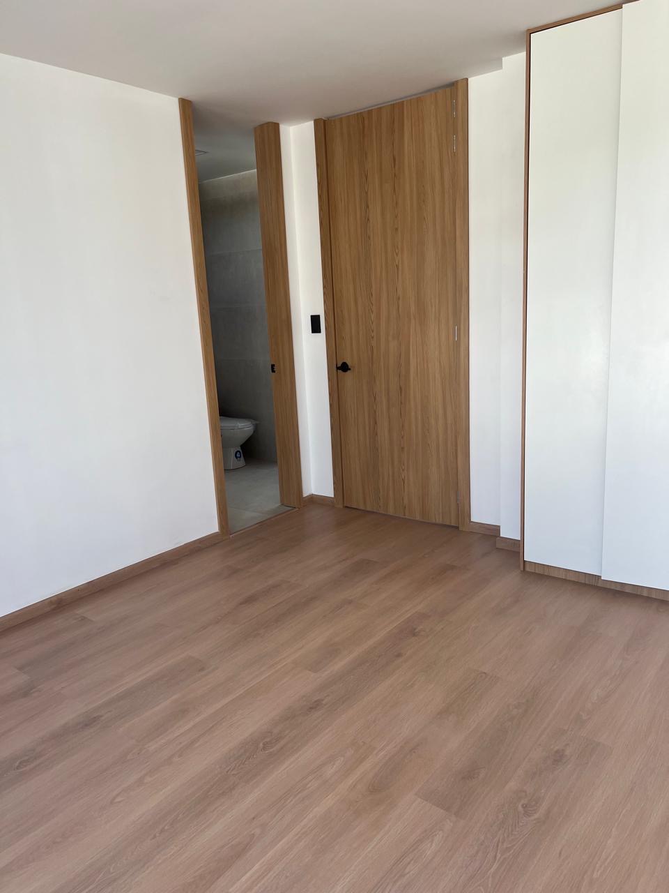Dormitorio de la casa modelo